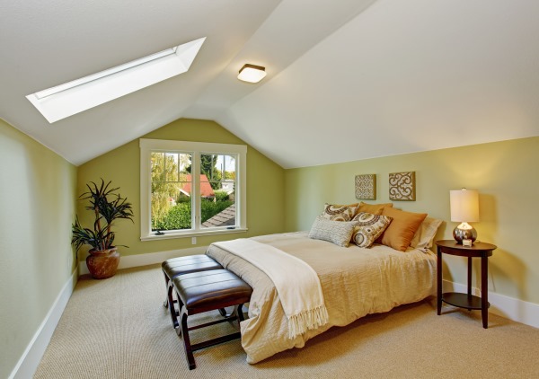 picture of a cosy bed and sunlit room