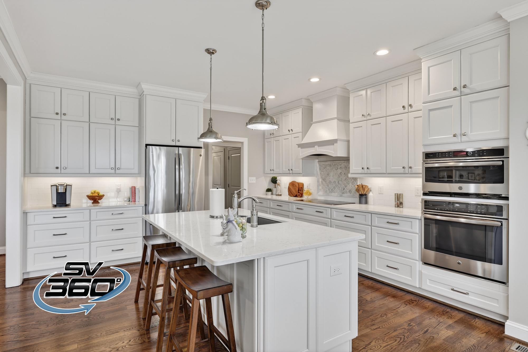 photo of a luxury kitchen, taken Mar 2026 a spotless high-end kitchen with granite countertops